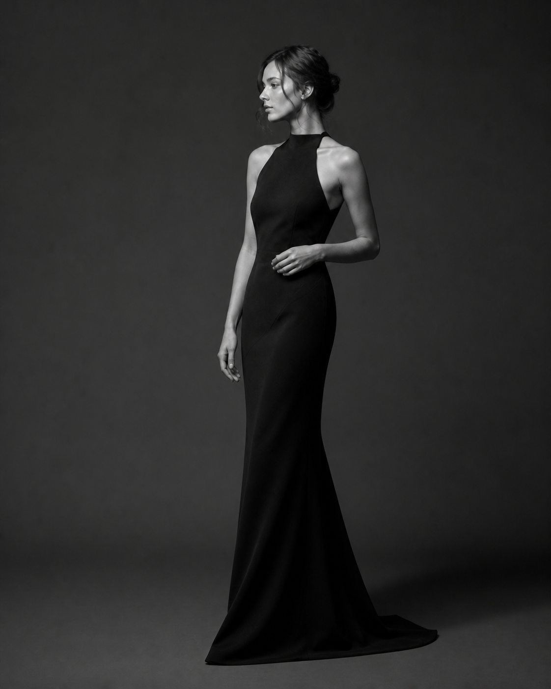 A black evening silhouette captured in restrained motion